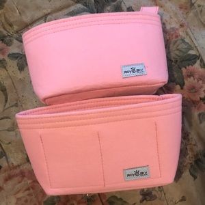 Two purse organizers.